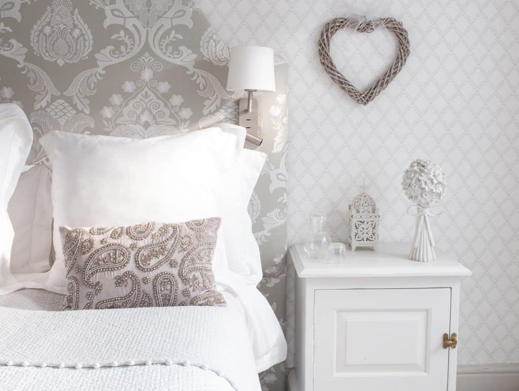 Guest Bed Neutral greys and crisp white linens
